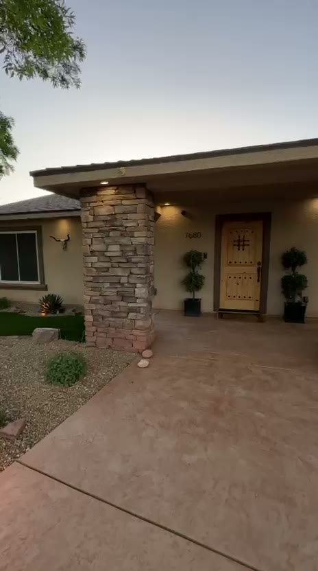 Desert front yard curb appeal walkthrough at dusk